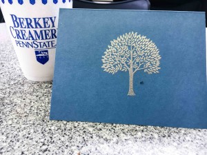 I carefully embossed this silver tree on the card and then dripped ice cream on it. Ooops.